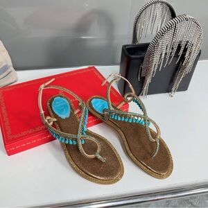 Women's Rene Caovilla Crystal & Turquoise Tassel Thong Sandals in Gold